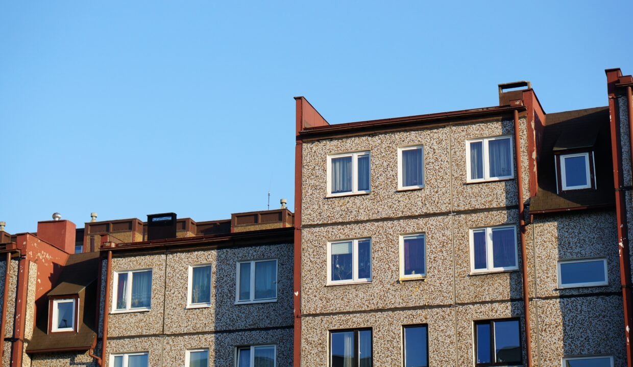 facade row apartment buildings against clear blue sky Discover the Hidden Gem: Properties for Sale in Bougainvillea Estate by CS Realty